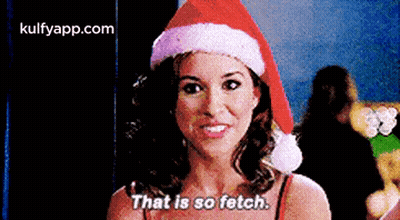 Woman In Santa Hat Saying That Is So Fetch GIF