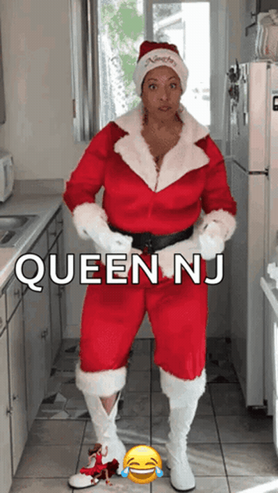 Woman In Santa Suit In Kitchen Queen NJ GIF