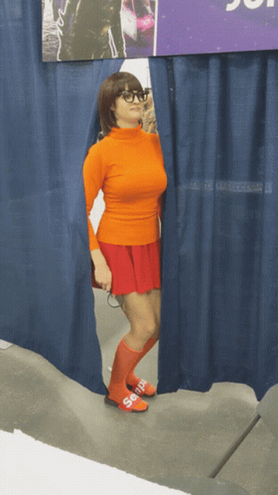 Woman In Scooby Doo Costume Behind Curtain GIF