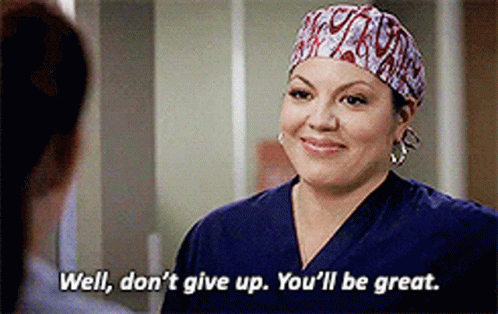 Woman In Scrub Hat Saying Well Don't Give Up You'll Be Great GIF
