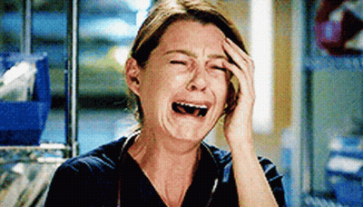 Woman In Scrub Top Crying GIF