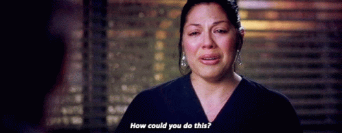Woman In Scrub Top Crying Talking To Man GIF