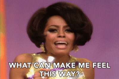 Woman In Sequined Dress Asking What Can Make Her Feel This Way GIF