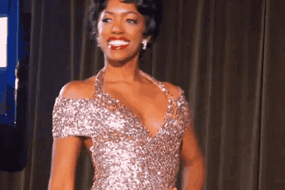 Woman In Sequined Dress Smiling GIF