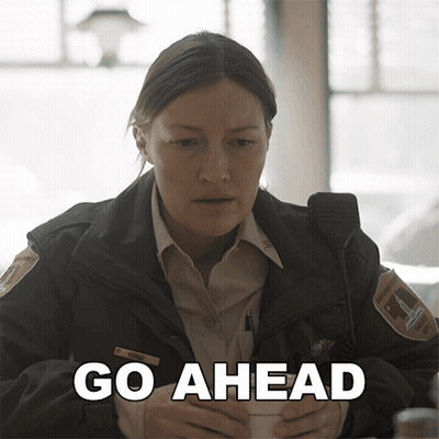 Woman In Sheriff Uniform Holding Coffee Saying Go Ahead GIF