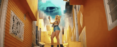 Woman In Shorts Holding Umbrella In Alleyway GIF