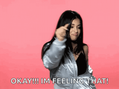 Woman In Silver Jacket Says Okay I'm Feeling That GIF