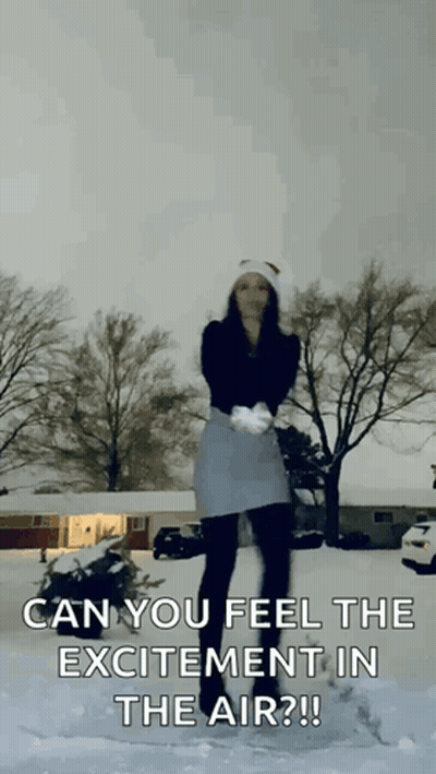 Woman In Skirt Throwing Snowballs GIF
