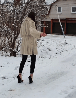 Woman In Snow Slipping On Ice Mishap GIF