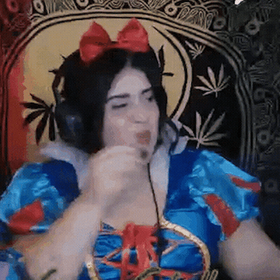 Woman in Snow White Costume Wearing Headphones Eating
