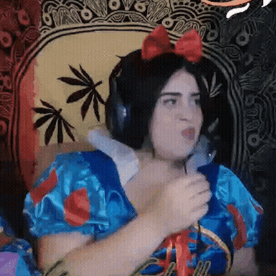 Woman In Snow White Costume With Headphones And Bow GIF