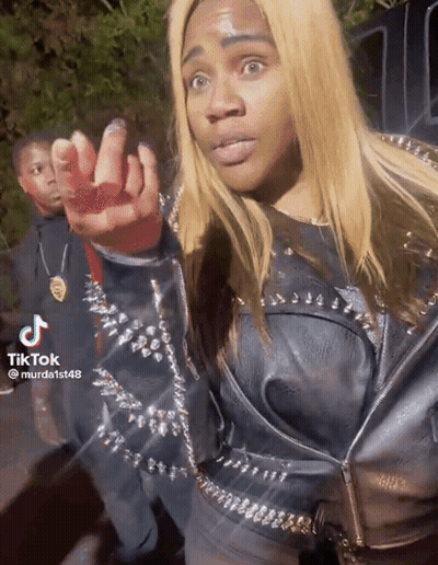Woman In Spiked Leather Jacket Giving Middle Finger GIF