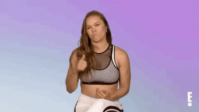 Woman In Sports Bra Giving Thumbs Up GIF