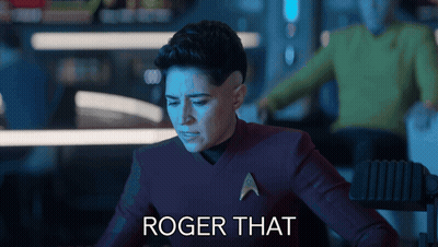 Woman In Star Trek Uniform Saying Roger That GIF