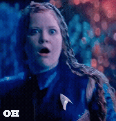 Woman In Star Trek Uniform Surprised Saying Oh GIF