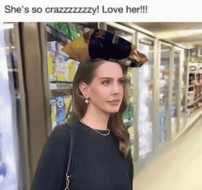 Woman In Store With Bag On Head Saying She's So Crazzzzzzy Love Her GIF