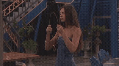 Woman In Strapless Denim Dress With Necklace GIF
