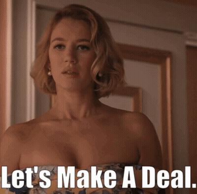 Woman In Strapless Dress Saying Lets Make A Deal GIF
