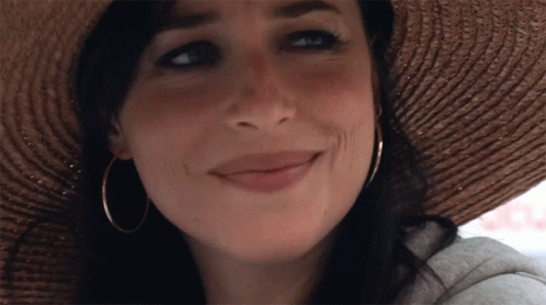 Woman In Straw Hat And Hoop Earrings Smiling GIF