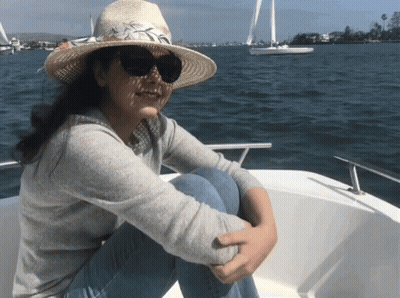 Woman In Straw Hat And Sunglasses On Boat GIF