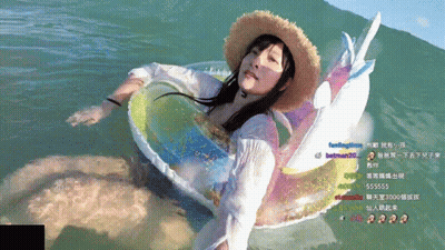 Woman In Straw Hat On Float GIF