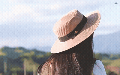 Woman In Straw Hat With Black Ribbon GIF
