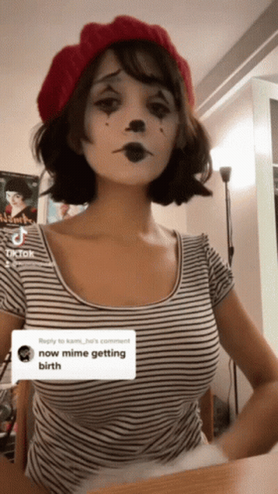 Woman In Striped Shirt And Red Beret Saying Now Mime Getting Birth GIF