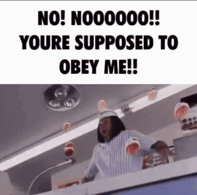 Woman In Striped Shirt At Microphone Saying No GIF