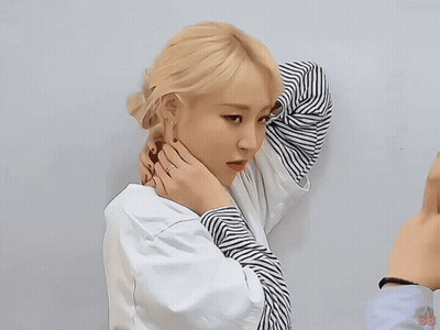 Woman In Striped Shirt Being Held GIF