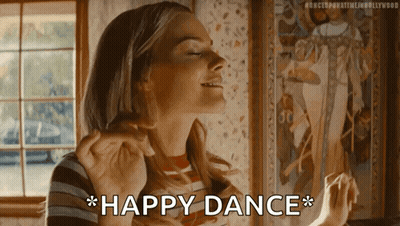 Woman In Striped Shirt Happy Dance GIF