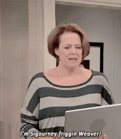 Woman In Striped Shirt Holding Laptop GIF