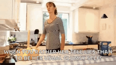 Woman In Striped Shirt Holding Rolling Pin GIF