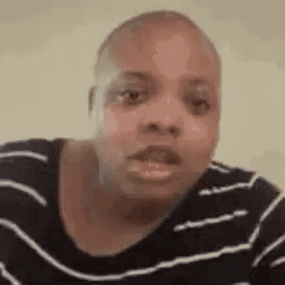 Woman In Striped Shirt Making Funny Face GIF