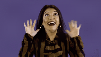 Woman In Striped Shirt Making Funny Face GIF