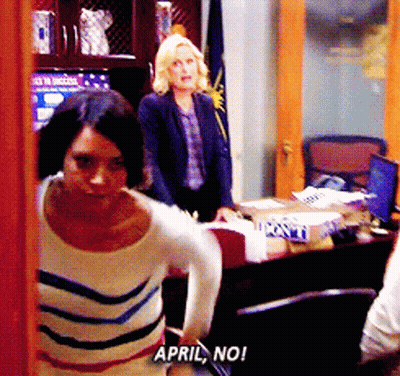 Woman In Striped Shirt Saying April No GIF