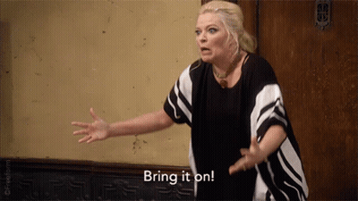 Woman In Striped Shirt Saying Bring It On GIF
