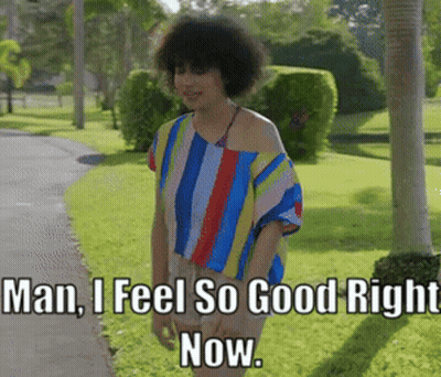 Woman In Striped Shirt Says Man I Feel So Good Right Now GIF