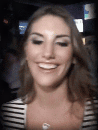 Woman In Striped Shirt Smiling At 8:08 Clock GIF
