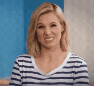 Woman In Striped Shirt Smiling Funny Face GIF