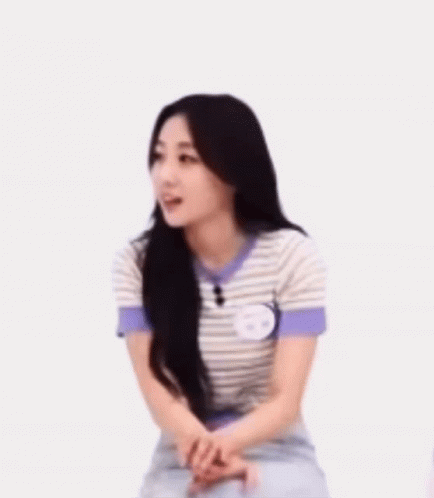 Woman In Striped Shirt Smiling Sitting GIF