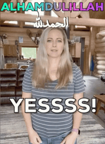 Woman In Striped Shirt With Yesss Sign GIF