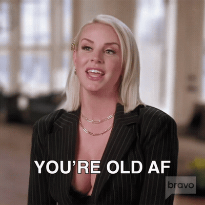 Woman In Striped Suit Saying You're Old AF GIF