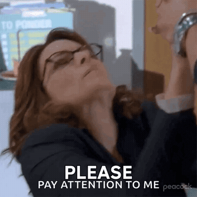 Woman In Suit And Glasses Talking On Cell Phone GIF