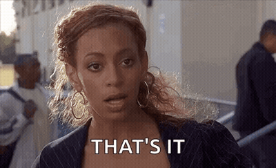 Woman In Suit And Hoop Earrings Saying That's It GIF