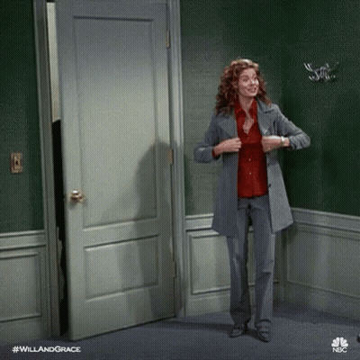 Woman In Suit And Red Shirt GIF