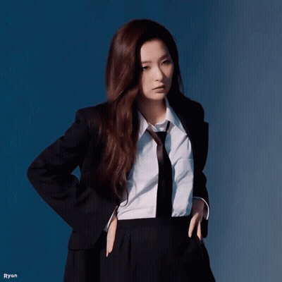 Woman In Suit And Tie Hands In Pockets Ryan GIF