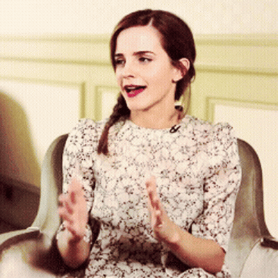 Woman In Suit And Tie With Bad Girl On Sleeve GIF