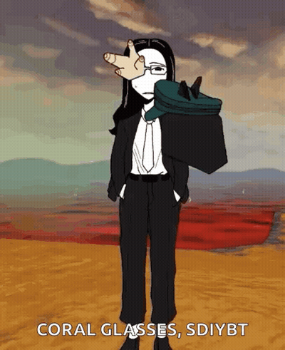 Woman in Suit and Tie With Coral Glasses