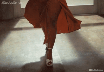 Woman In Suit And Tie With Happy Concern GIF