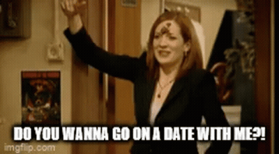 Woman In Suit Asking For A Date GIF